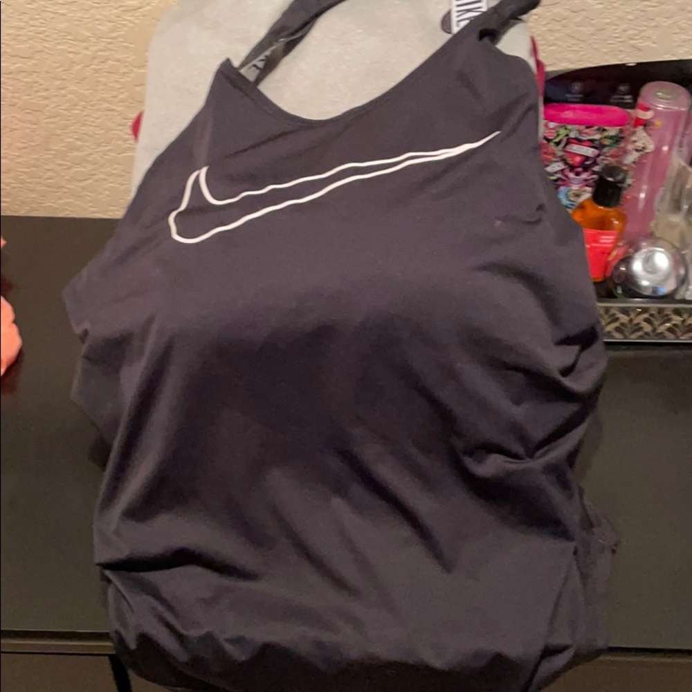 3 Nike tops